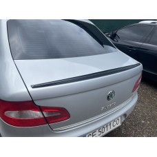 Спойлер LIP (Sunplex, черный) (115,8см*6,3см) для Skoda Superb 2009-2015 гг