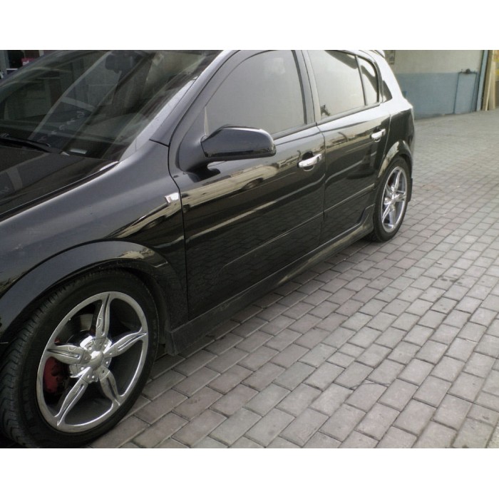 Бічні спідниці HB (під фарбування) для Opel Astra H 2004-2013 рр